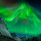 Aurora Borealis über den BErgen von Tromvik