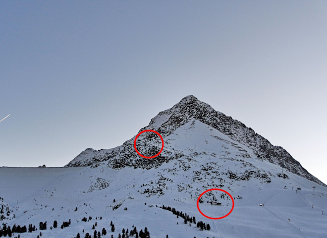 <p>Im Hintergrund der Zwölferkogel. Die roten Kreise zeigen "Die Mute" und das "Graf Ferdinand Haus".</p>